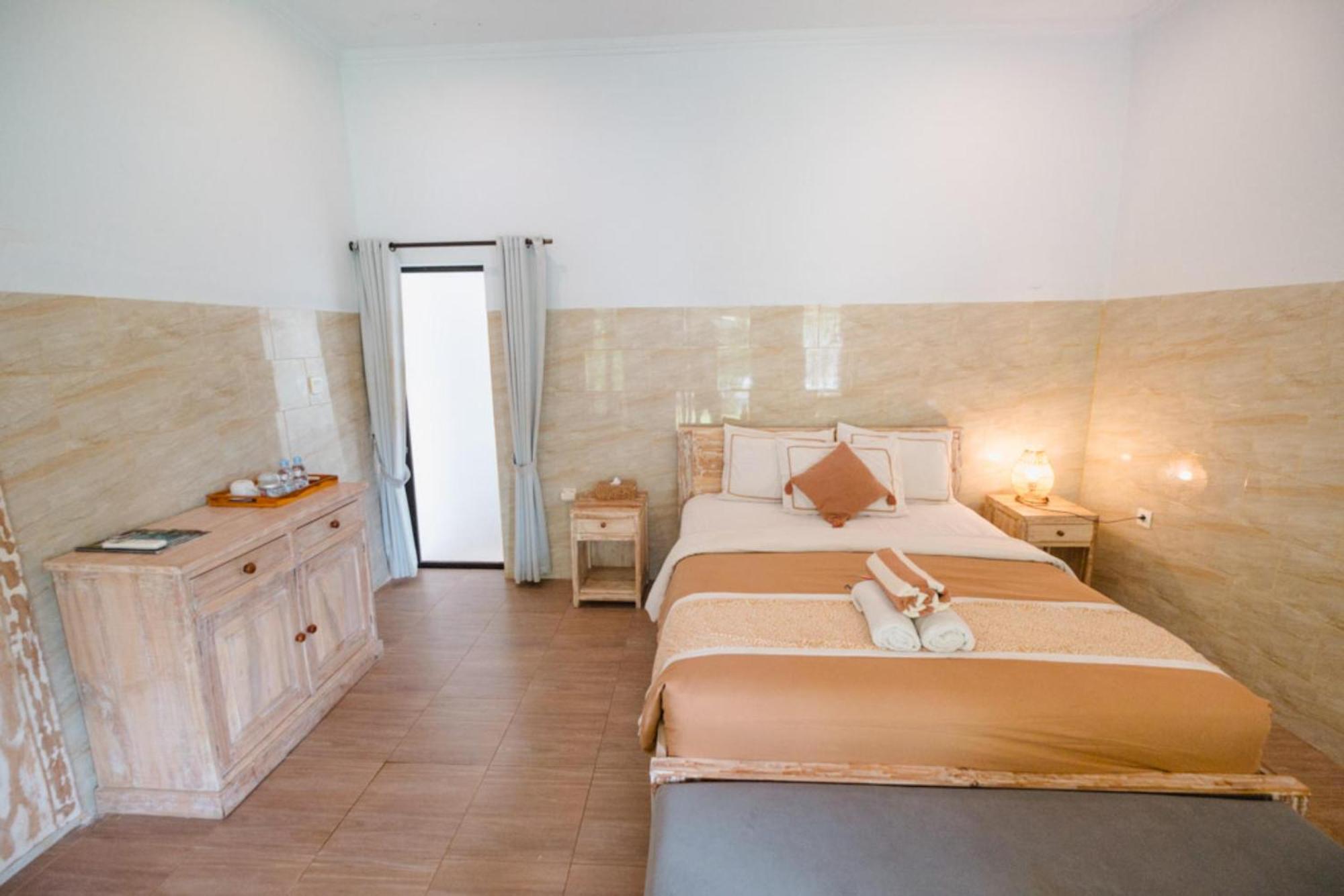 Agung Wiwin Homestay & Restaurant Mengwi Екстер'єр фото